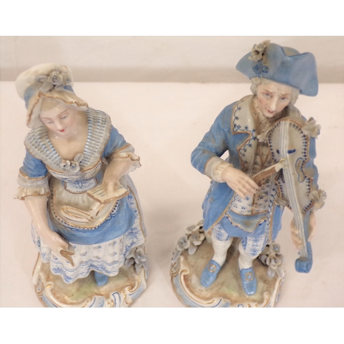 289 - Pair of Meissen figures of a lady with book and violinist, on foliate decorated bases