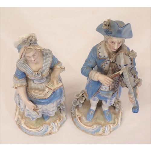 289 - Pair of Meissen figures of a lady with book and violinist, on foliate decorated bases