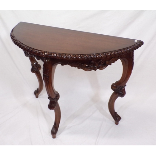 36 - Edwardian mahogany demi-lune hall or side table with rope decorated frieze, on carved cabriole legs