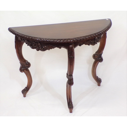 36 - Edwardian mahogany demi-lune hall or side table with rope decorated frieze, on carved cabriole legs