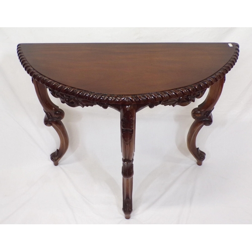 36 - Edwardian mahogany demi-lune hall or side table with rope decorated frieze, on carved cabriole legs