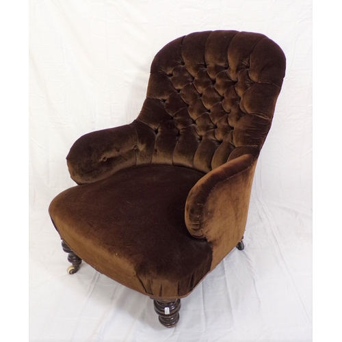 384 - Victorian style upholstered back armchair with shaped arms, on turned legs with stretchers