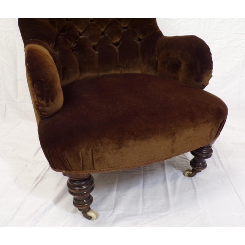 384 - Victorian style upholstered back armchair with shaped arms, on turned legs with stretchers