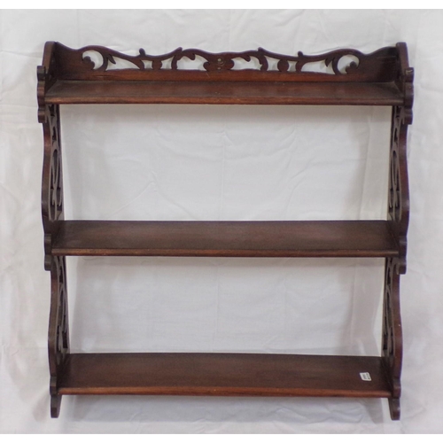 47 - Edwardian mahogany three tier wall shelf with ornate fretwork sides