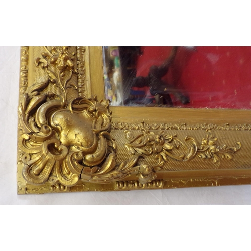 48 - Large gilt framed wall mirror with ornate scroll and foliate decoration