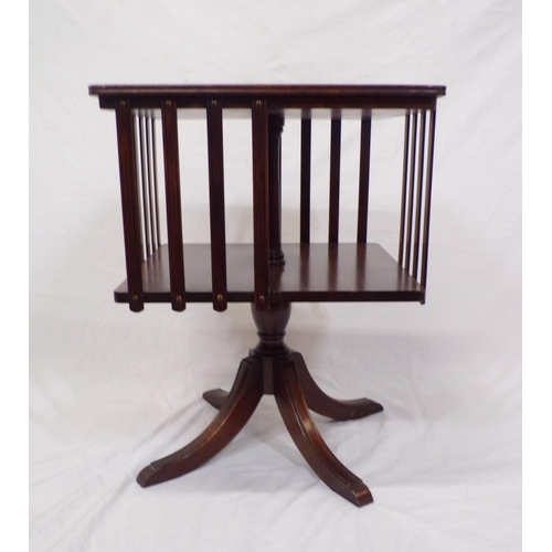 49 - Edwardian mahogany small revolving bookcase with leatherette inset, railed sides, on quadrapod