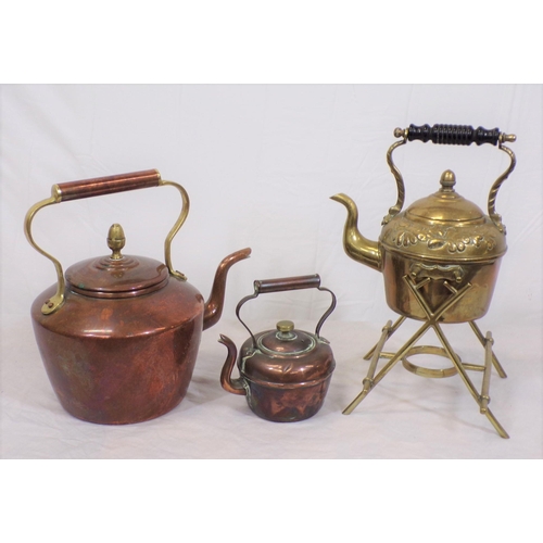 52 - Three antique teapots - two copper and one brass