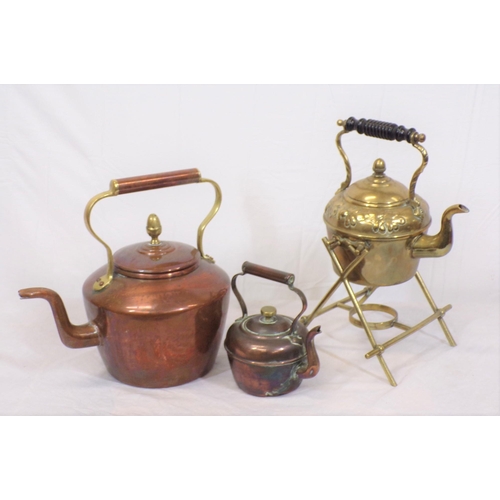 52 - Three antique teapots - two copper and one brass