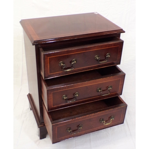 66 - Edwardian inlaid mahogany small chest of three drawers with shaped drop handles, on bracket feet