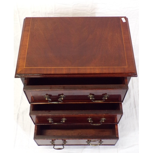 66 - Edwardian inlaid mahogany small chest of three drawers with shaped drop handles, on bracket feet