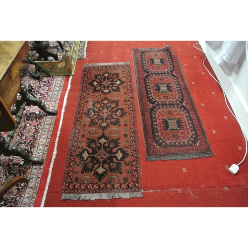 78 - Two Persian style small hall runners with foliate decoration