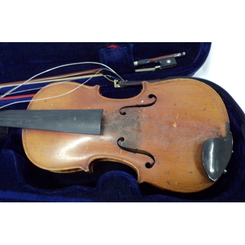 83 - Vintage violin in fitted carrying case, with bow