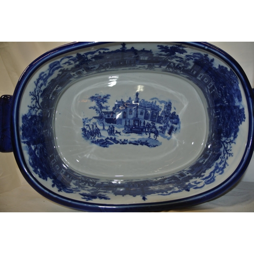 146 - Two Staffordshire style footbaths or bowls with blue and white scenic decoration and shaped handles