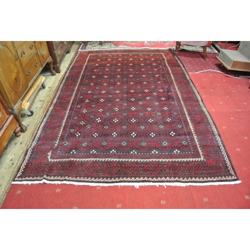 44 - Rich ground hand woven Persian belouch tribal rug