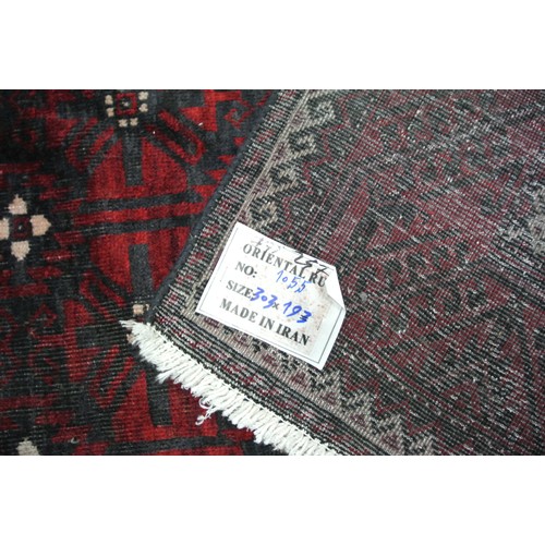 44 - Rich ground hand woven Persian belouch tribal rug