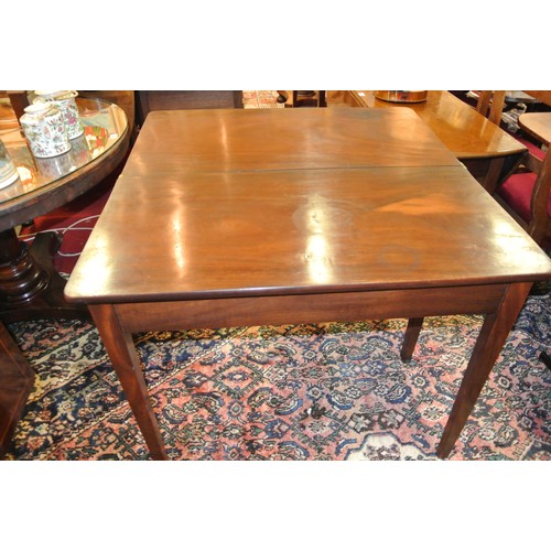 101 - Georgian mahogany tea table with fold-over top, pull-out gateleg support, on square tapering legs