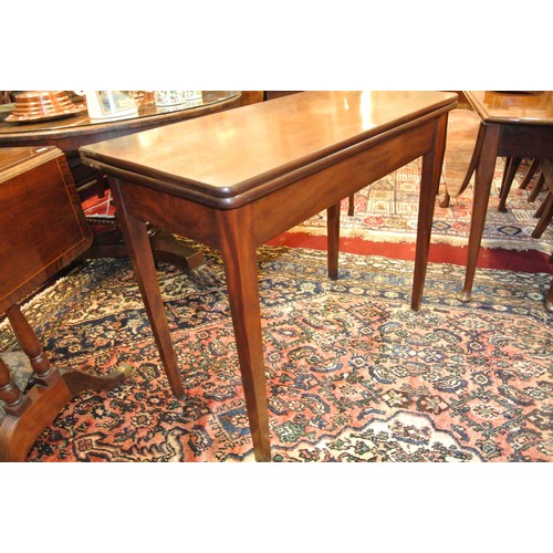 101 - Georgian mahogany tea table with fold-over top, pull-out gateleg support, on square tapering legs