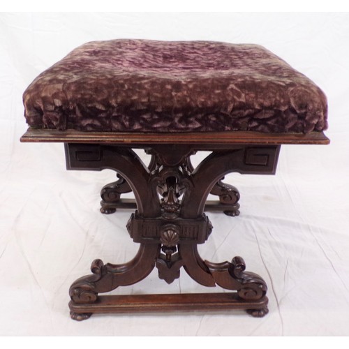 253 - Georgian style walnut stool with upholstered top, ornate scroll decorated columns and stretcher, on ... 