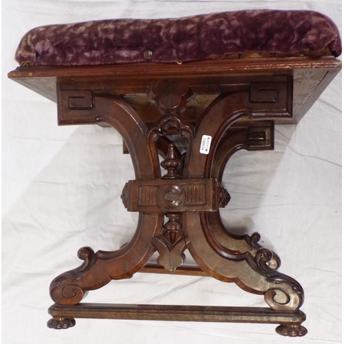 253 - Georgian style walnut stool with upholstered top, ornate scroll decorated columns and stretcher, on ... 