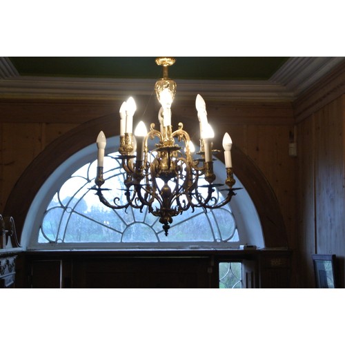 339 - Ornate French style 8 branch chandelier with scroll and foliate decoration