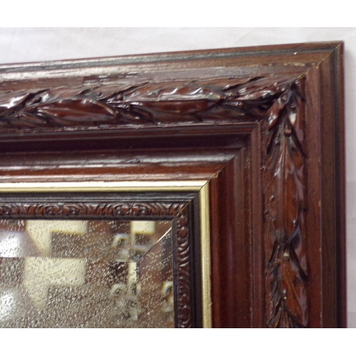 22 - Edwardian bevelled glass wall mirror with foliate frame