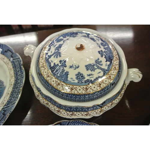 47 - Twenty two piece Booths 'Real Old Willow' pattern dinner service with blue and white decoration and ... 