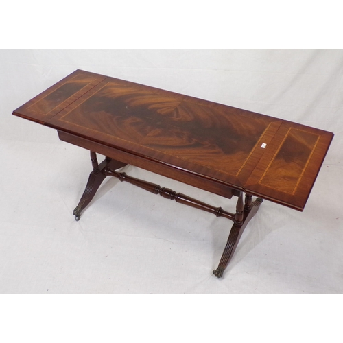 61 - Edwardian small sofa shaped coffee table with drop leaves and reeded legs