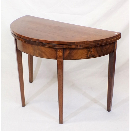 91 - Edwardian inlaid mahogany demi-lune card table with fold-over top, on tapering legs