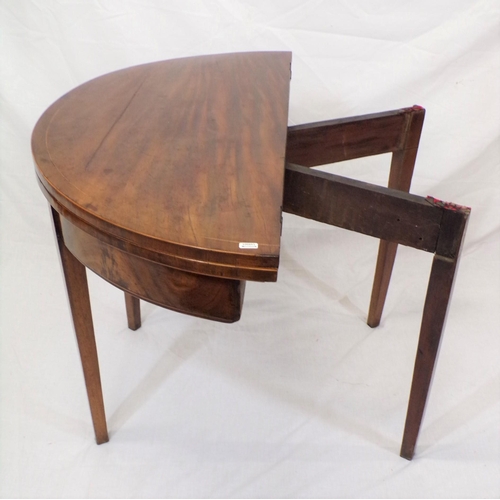 91 - Edwardian inlaid mahogany demi-lune card table with fold-over top, on tapering legs