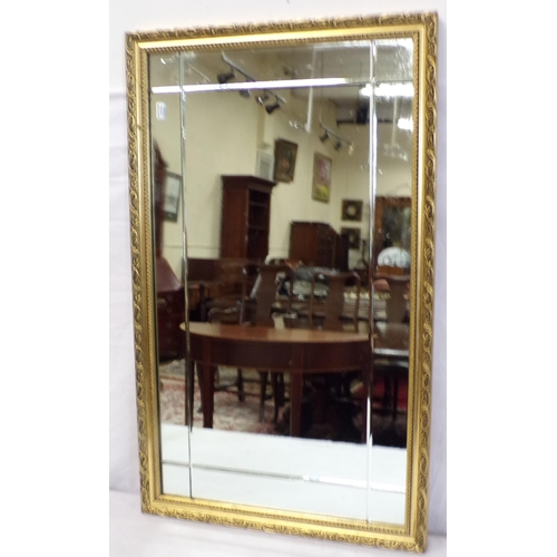 104 - Wall mirror with foliate decorated frame