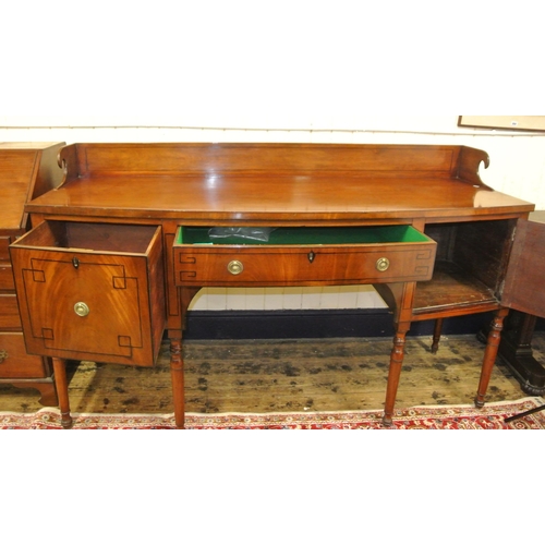 120 - Irish bow fronted inlaid mahogany sideboard with tray back, frieze drawer, 2 side presses, on turned... 