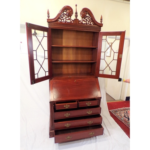 140 - Edwardian design bureau bookcase with scroll pediment, shelved top, fitted interior with fall-out fr... 