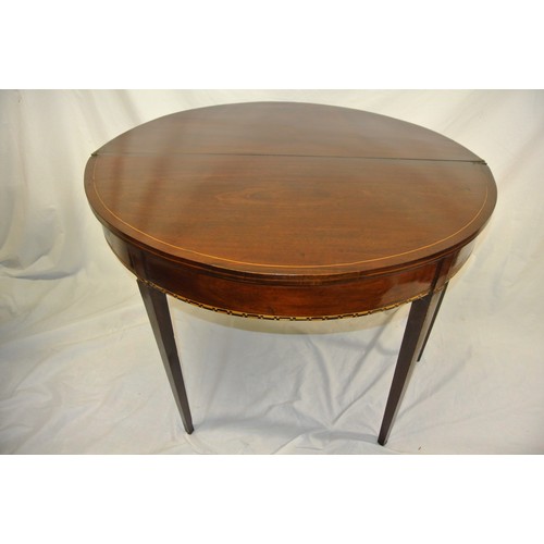 145 - Edwardian mahogany demi lune tea table with string inlay, fold-over top, gateleg support, inlaid fri... 