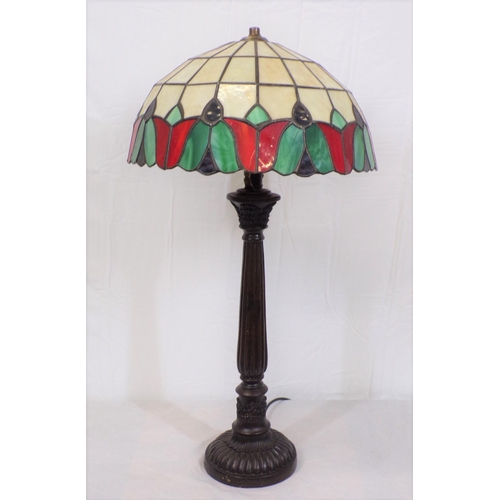 183 - Art Deco bronzed electric lamp with ornate multi-coloured shade