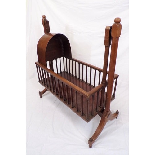 206 - Victorian style mahogany child's swing cradle with domed top, railed sides, on bracket feet