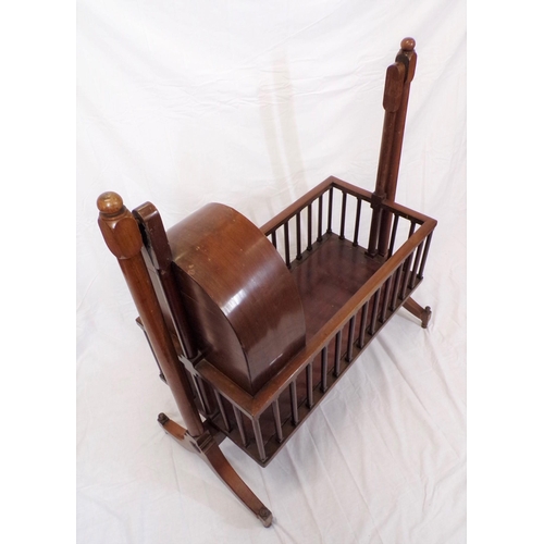 206 - Victorian style mahogany child's swing cradle with domed top, railed sides, on bracket feet