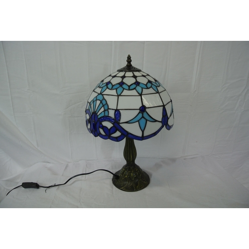 224 - Ornate bronzed electric table lamp with blue and white multi-coloured faceted shade