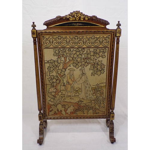 21 - Victorian mahogany framed firescreen with figured needlepoint, ornate foliate carved pediment, leaf ... 