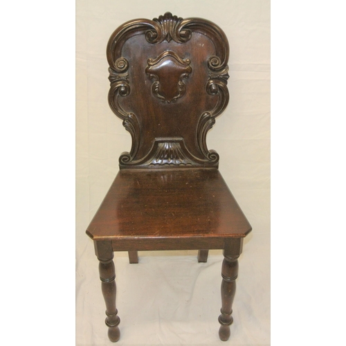 291 - Victorian mahogany hall chair with scroll and foliate decorated shaped back, on baluster turned legs