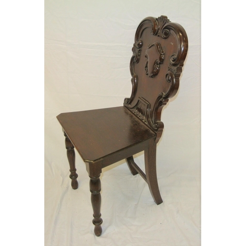 291 - Victorian mahogany hall chair with scroll and foliate decorated shaped back, on baluster turned legs