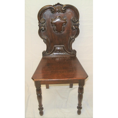 291 - Victorian mahogany hall chair with scroll and foliate decorated shaped back, on baluster turned legs