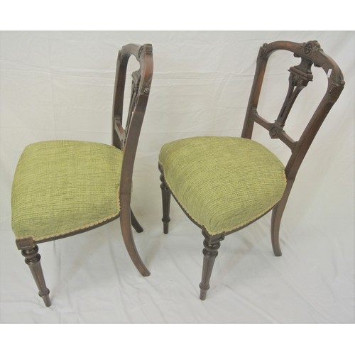 297 - Pair of Victorian mahogany chairs with pierced splats, upholstered seats, on turned tapering legs