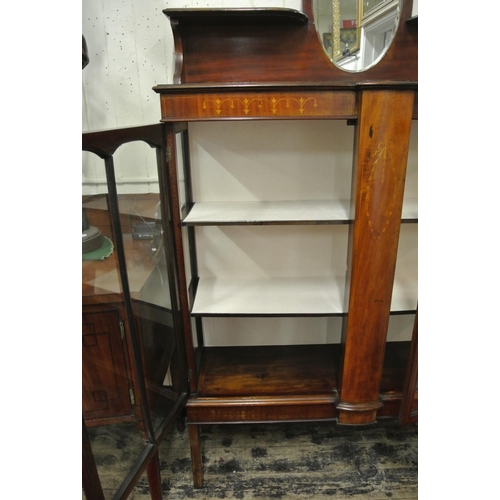 100 - Edwardian inlaid mahogany display cabinet with shaped top, oval bevelled mirror inset, glazed doors,... 