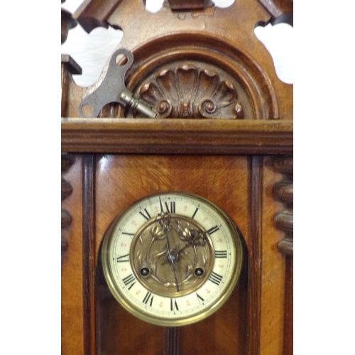 107 - Victorian mahogany cased Vienna wall clock with brass framed enamel dial and pendulum, with shaped f... 