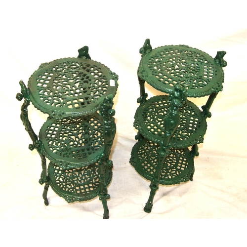 113 - Pair of three tier cast iron garden stands with foliate decoration