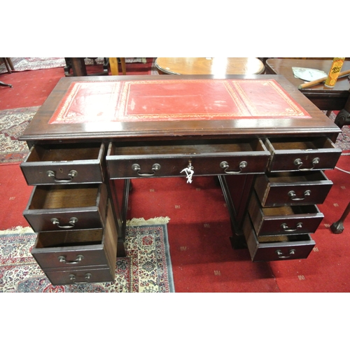 125 - Edwardian pedestal office desk with leatherette inset, three frieze drawers, six pedestal drawers, w... 