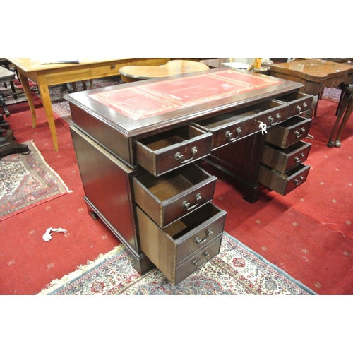 125 - Edwardian pedestal office desk with leatherette inset, three frieze drawers, six pedestal drawers, w... 