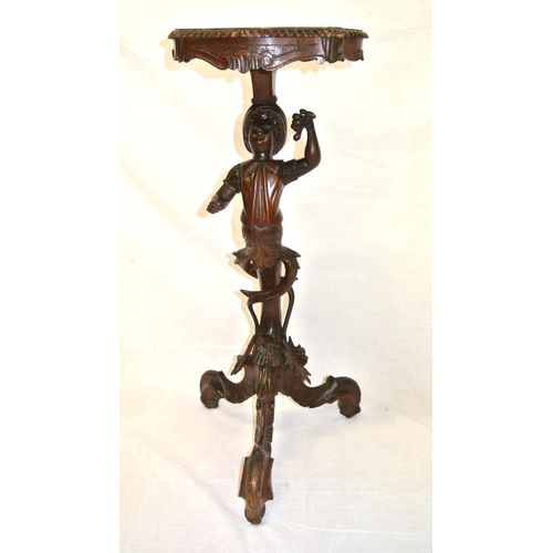 166 - Ornate Continental style carved timber lamp or occasional table, with boy carved figured column, wit... 