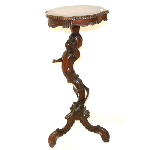 166 - Ornate Continental style carved timber lamp or occasional table, with boy carved figured column, wit... 