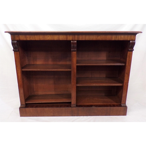 175 - Edwardian mahogany open bookcase with scroll decoration,  adjustable shelving, on oblong plinth